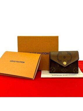 Louis Vuitton Box Portefeuille Zoe Monogram Giant Reverse Leather Trifold